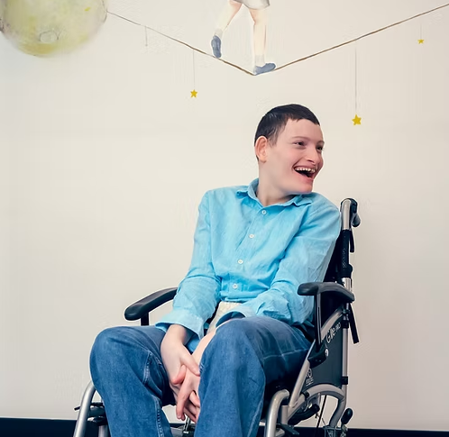 Young Man In Wheelchair Smiling